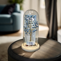 עץ אבנים במגוון צבעים על בסיס עץ מעוצב