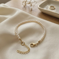 צמיד פנינים קטנות עגולות