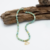 שרשרת רותם- מהמטייט זהב, חרוזי צדף ופולימר ותליון ציפור