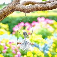 נערה על נדנדה -פסל מחוטי מתכת בעבודת יד