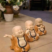 פסל בודהה בשלושה דגמים