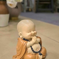 פסל בודהה בשלושה דגמים