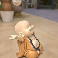 פסל בודהה בשלושה דגמים