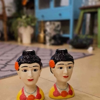 זוג פמוטי פרידה קאלו אדום