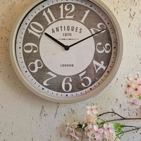 שעון קיר מעוצב אפרפר