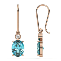 Earrings made of 14k gold set with Blue Topaz Suisse stones and diamonds Model EAG29