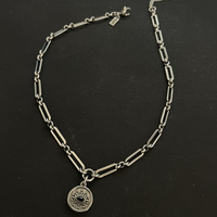 Black eye necklace