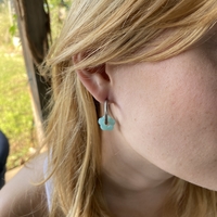 Silver plated hoop earrings with a stone bead - light blue flower