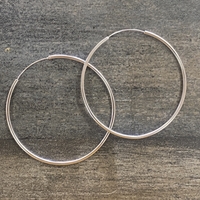 big silver hoop earrings