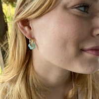 Gold plated hoop earrings with a stone bead - light blue flower