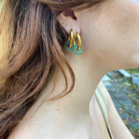 Gold plated hoop earrings with a stone bead - light green