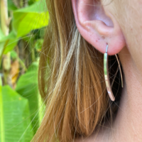 Thin open silver colored earrings