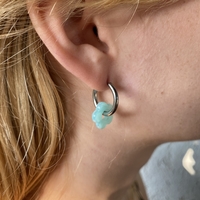 Silver plated hoop earrings with a stone bead - light blue flower