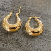 Thick gold hoop earrings