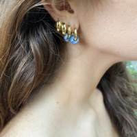 Gold plated hoop earrings with a stone bead - sky blue