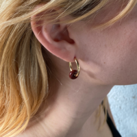 Gold plated hoop earrings with a stone bead - wine red