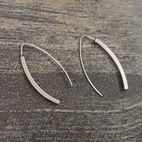 Thin open silver colored earrings