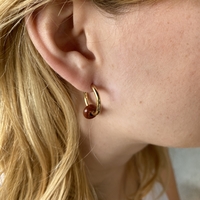 Gold plated hoop earrings with a stone bead - sparkling red