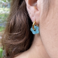 Gold plated hoop earrings with a stone bead - light blue flower