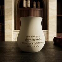 נטלה מעוגלת עם ברכה מוטבעת