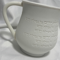 נטלה חרס מעוגלת לבנה