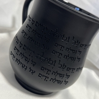 נטלה חרס מעוגלת שחורה