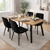 פינת אוכל קומפקטית הכוללת שולחן אוכל ו- 4 כיסאות מרופדים בגוון שחור דגם גולן-ריביירה