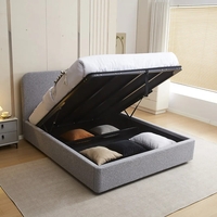 מיטה זוגית מעוצבת בריפוד בד בוקלה עם ארגז מצעים מעץ דגם נוגה אפור