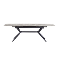 שולחן אוכל אבן קרמית באורך 1.8 מ' נפתח ל- 2.4 מ' עם רגלי ברזל דגם חץ אפור מבריק