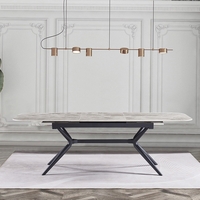 שולחן אוכל אבן קרמית באורך 1.8 מ' נפתח ל- 2.4 מ' עם רגלי ברזל דגם חץ אפור מבריק