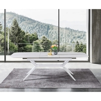 שולחן אוכל אבן קרמית באורך 1.8 מ' נפתח ל- 2.4 מ' עם רגלי ברזל דגם חץ אבן