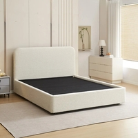 מיטה זוגית מעוצבת בריפוד בד בוקלה עם ארגז מצעים מעץ דגם נוגה שמנת