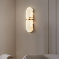 فالنسيا كبسولة | وحدة إضاءة جدارية عصرية من الأونيكس الطبيعي والنحاس