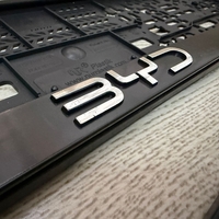 זוג מסגרות ללוחית רישוי עם סמל BYD