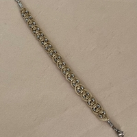 צמיד מקרמה בז׳ עם חרוזי כסף