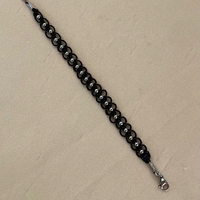 צמיד מקרמה שחור עם חרוזי כסף