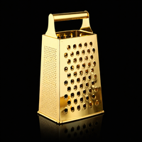 סט מגרדת וקולפן נירוסטה בגימור זהב