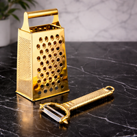 סט מגרדת וקולפן נירוסטה בגימור זהב