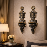 סט מחזיקי נרות – פמוטי קיר ממתכת לתלייה שחור זהב