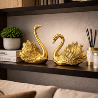 זוג פסלים ברבורים זהב דקורטיביים