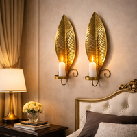 סט פמוטי קיר בצורת עלה – מחזיקי נרות ממתכת בגימור זהב