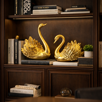 זוג פסלים ברבורים זהב דקורטיביים