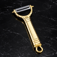 סט מגרדת וקולפן נירוסטה בגימור זהב