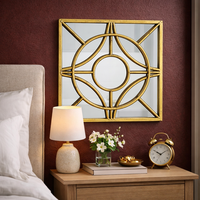 מראת קיר מתכת מוזהבת