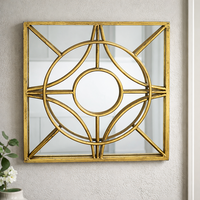 מראת קיר מתכת מוזהבת