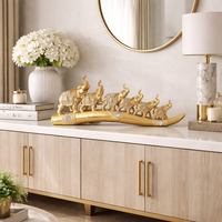 פסל פילים זהב לעיצוב הבית