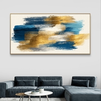 תמונת קנבס מופשטת לרוחב עם משיכות צבע בכחול וזהב – תכשיט לבית