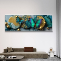 תמונת קנבס פנורמית עם פרפרים בגווני טורקיז וזהב בהדפסה חלקה – תכשיט לבית