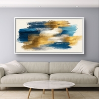 תמונת קנבס מופשטת לרוחב עם משיכות צבע בכחול וזהב – תכשיט לבית