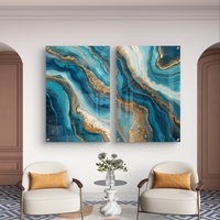 תמונת זכוכית זוגית בעיצוב אבסטרקט בגווני טורקיז, כחול וזהב עם זרימה טבעית
